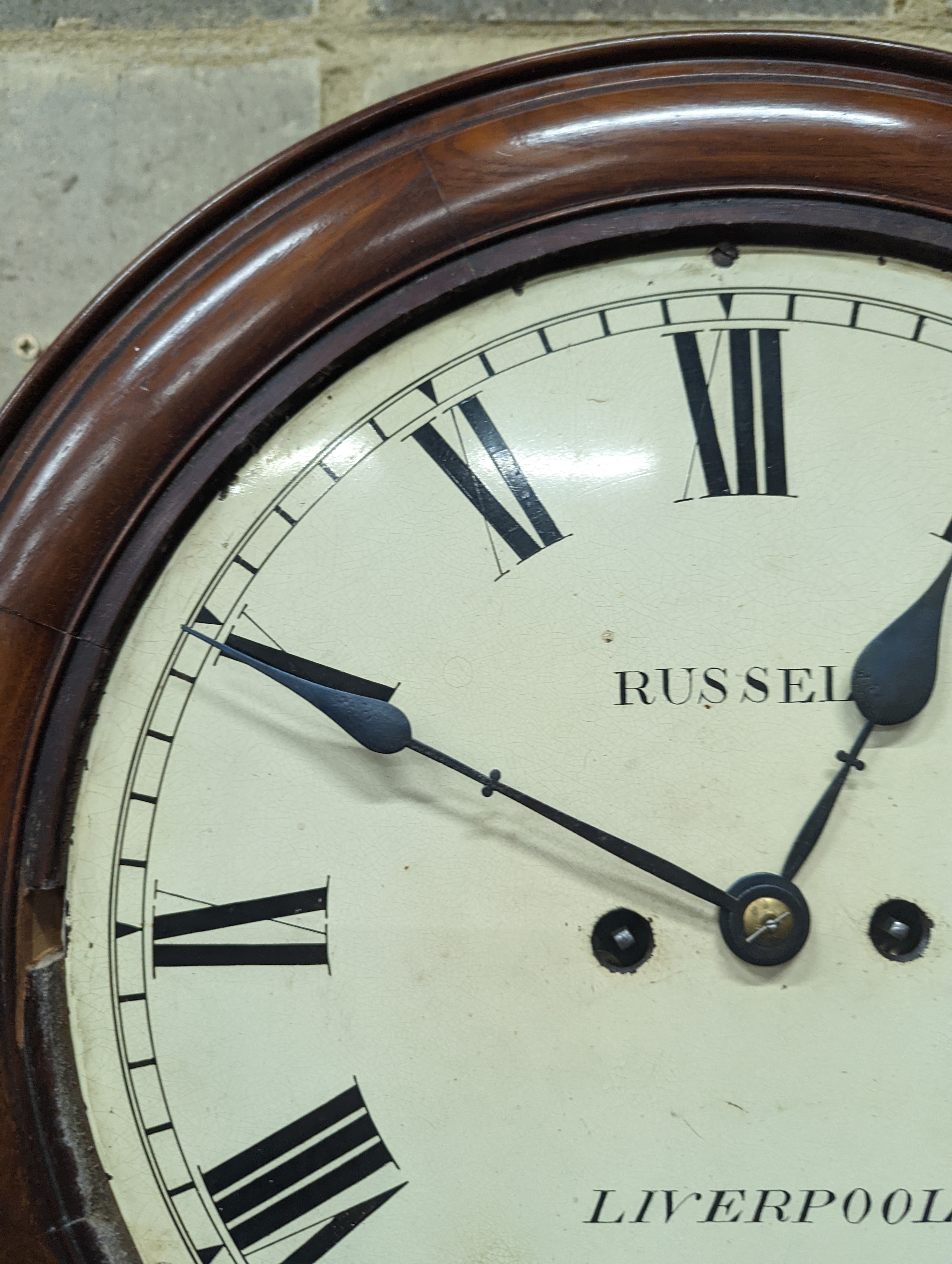 A Victorian mahogany drop dial wall clock, with twin fusee movement, and circular white painted Roman dial signed 